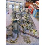 A collection of metalware, including candle sticks, part of a tin plate steam train model, af,