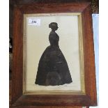 A 19th century black silhouette of a full length portrait of a lady in a dress, 9ins x 6.5ins,