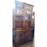 A Rackstraw mahogany bureau bookcase, the glazed upper section fitted with adjustable shelves, the