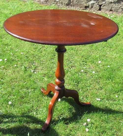 A 19th century mahogany oval tripod table, diameter 25.5ins x height 28ins