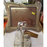 A hallmarked silver photograph frame, aperture size 6ins x 8ins, together with a silver plated
