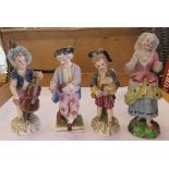 A pair of 19th century figures, af, together with two other 19th century figures, one marked with