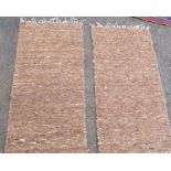 Two brown rugs, each 28ins x 56ins