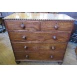 A 19th century mahogany chest, of two short over three long drawers, with moulded decoration to