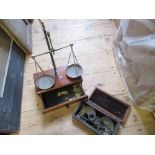 A 19th century mahogany cased set of Avery scales, together with another