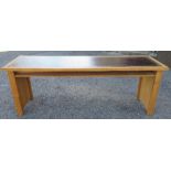 A modern desk, with inset leatherette writing surface, 84.5ins x 27ins x height 30ins, together with