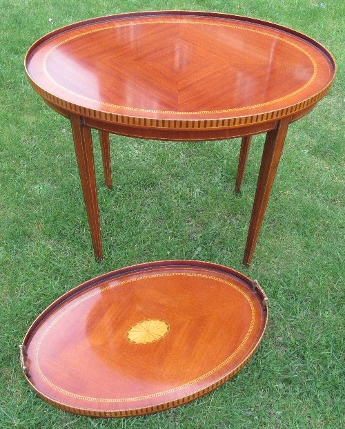 A mahogany and satinwood inlay oval table, the top with galleried sides, raised on square tapering - Image 2 of 2