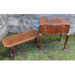 A two drawer walnut veneered cutlery table, containing a quantity of Community Plate cutlery and