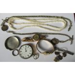 A small collection of jewellery items, including an open faced pocket watch, a watch chain, and