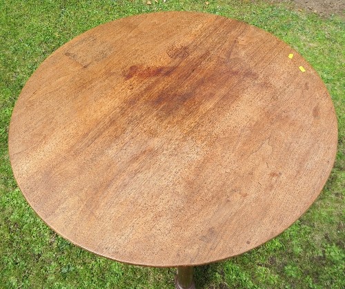 A 19th century mahogany circular table, raised on four legs united by a cross stretcher diameter - Image 3 of 3