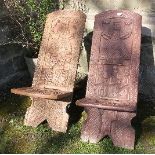 Two tribal style chairs, with carved decoration of figures