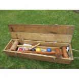 A croquet set, in an unmarked box