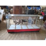 A Hollards Storefitters shop cabinet, width 72is x depth 24ins  x height 36ins, crack to top glass