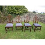 A set of four 19th century dining chairs, with pierced splats