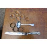 A collection of hallmarked silver to include a ladle, kings pattern handled bread knife, a set of