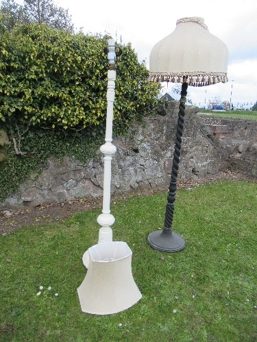 Two standard lamps, one with barley twist column, the other painted white
