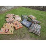 A collection of kilim style cushions