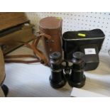 A pair of Voigtlender & Sohn binoculars, and a Zenit camera