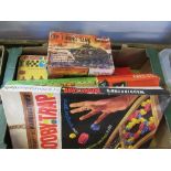 A box of assorted repro games, including Waddington's Booby Trap