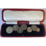 A cased set of Maundy money, with other coins