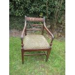 A 19th century style mahogany open armchair