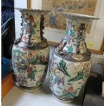 A pair of large oriental vases, max height 18ins, one is chipped to rim, the other is cracked