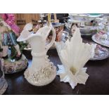 A Belleek porcelain ewer, together with a Royal Worcester vase, af