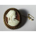A Victorian gold shell cameo brooch, unmarked, with locket back, 3.6cm x 3cm
