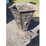 A wrought iron planter, having stylised mask and foliate decoration, diameter 15.5ins