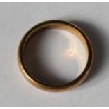 A 22 carat gold plain wedding ring, 6.8g gross