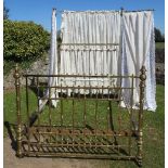 A James Shoolbred & Co brass double bed, with drapes, 83ins x 60ins, height 84insCondition Report: