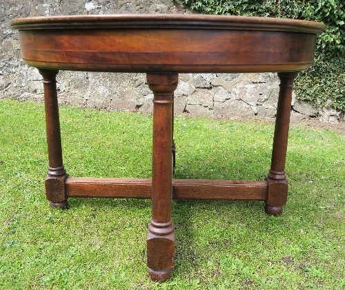 A 19th century mahogany circular table, raised on four legs united by a cross stretcher diameter - Image 2 of 3