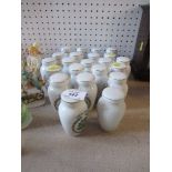 A collection of Franklin Mint herb and spice jars