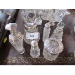 Six silver mounted dressing table bottles