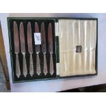 A cased set of six silver handled tea knives