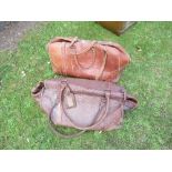 Two leather travel bags