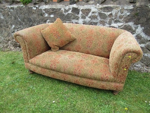 A two seater sofa, with fire labels, width 69ins x depth 37.5ins x height 30ins