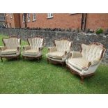 Two pairs of similar deep button back arm chairs, trade only