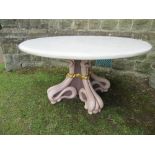 A continental marble topped circular table, having an ornate painted base, the marble is not fixed