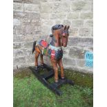 A continental polychrome painted rocking horse, height approximately 45ins