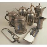 A collection of Swedish pewter, to include apair of covered tankards, a pair of wall mirrors with