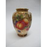 A Royal Worcester vase, decorated half round with hand painted fruit by Freeman, height 4.5ins - not