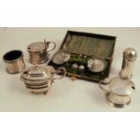 A hallmarked silver three piece cruet set, comprising open salt, mustard pot and pepper pot,