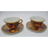 Two Royal Worcester tea cups and saucers, decorated with hand painted fruit by Freeman - not damaged