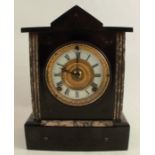 A Victorian black slate mantel clock, with marble inlay to the architectural case, the movement