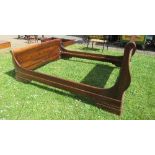 A mahogany double bed frame, of sleigh bed form, bearing label Willis & Gambier, and stamped Sierra,