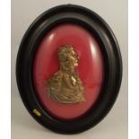A 19th century relief gilt metal portrait plaque, of the Duke of Wellington, in an oval frame,