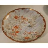 A Japanese wall plate, decorated with geese in a landscape, diameter 14ins - decoration looks
