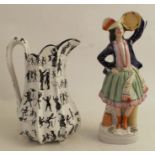 A 19th century century Staffordshire figure, of a lady with tambourine, height 10.5ins, together