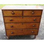 A Victorian mahogany chest of drawers, fitted with two short drawers over three graduated long